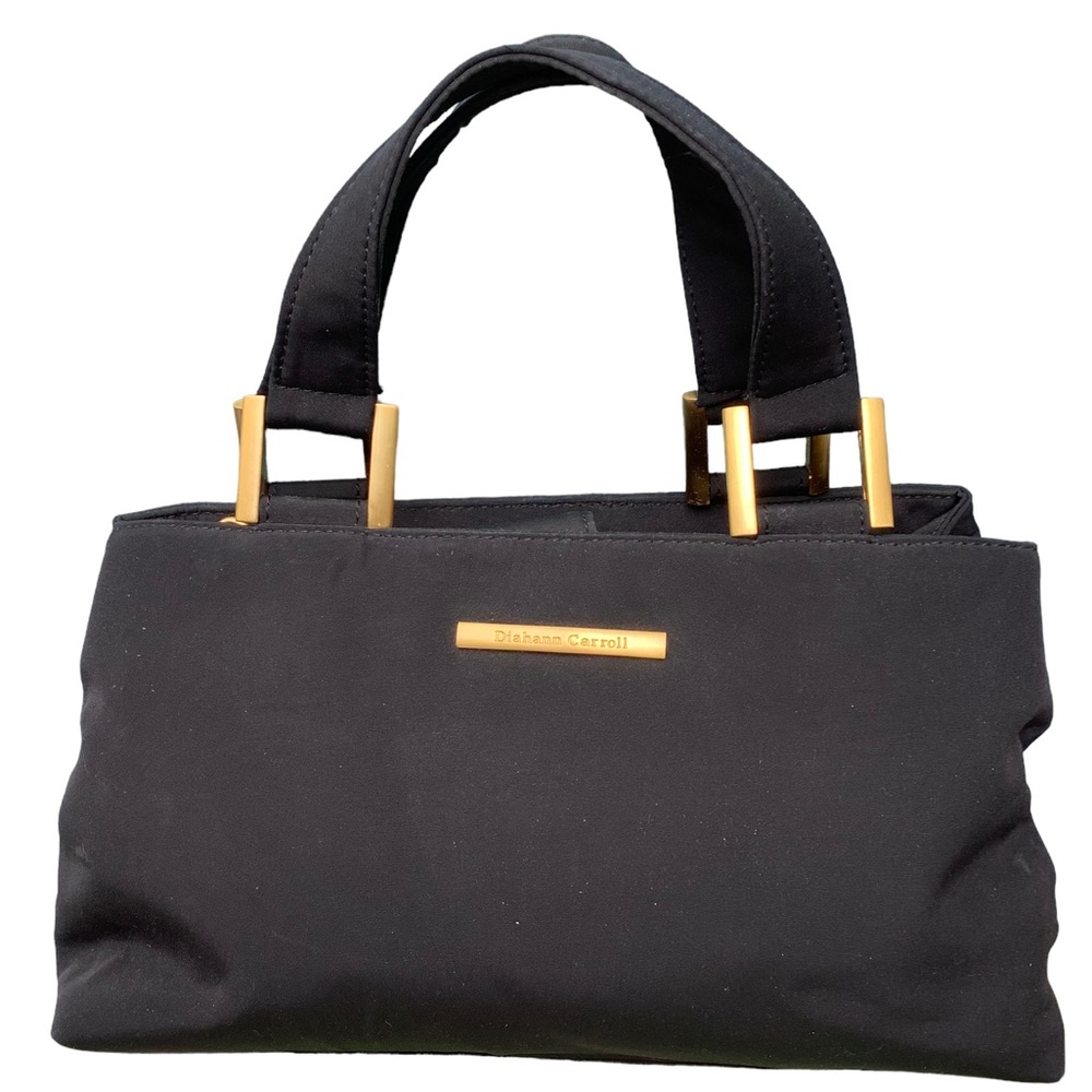 DIAHANN CAROLL‎ BLACK HAND HELD WITH GOLD HARDWARE FABRIC HANDBAG.